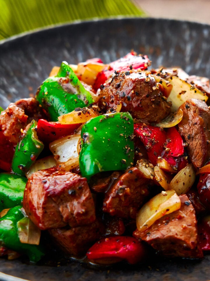 Black Pepper Beef is a classic Chinese stir-fry made with beef, onions, and peppers.