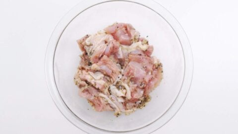 Marinating chicken with black pepper sauce.
