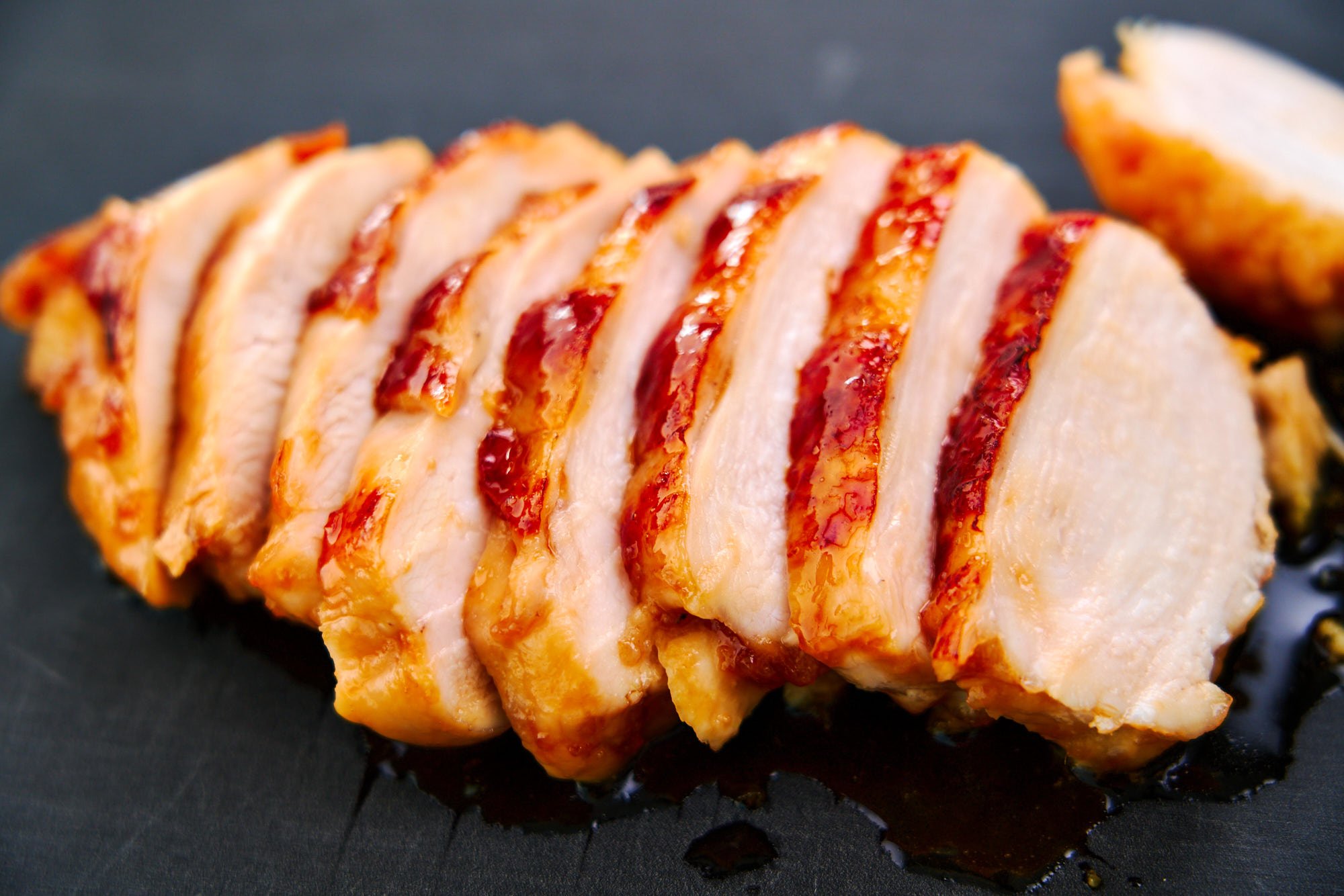 Sliced chicken breast teriyaki.