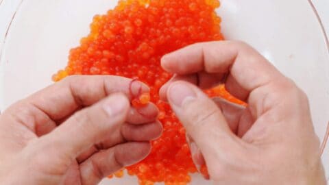 Cleaning ikura caviar.