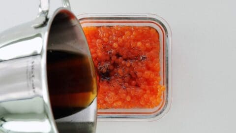 Pouring brine into ikura to cure.