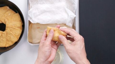 Wrapping sushi rice in inari tofu pockets.