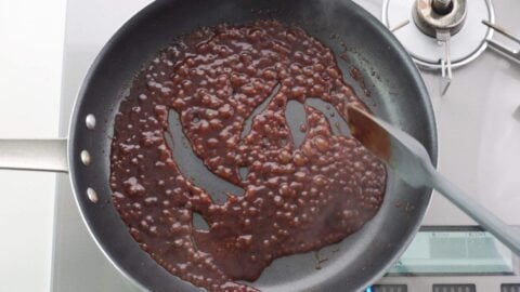 Hamburg steak sauce in a frying pan.