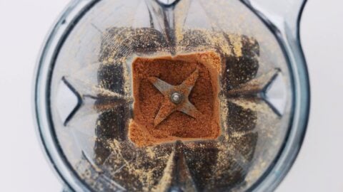Grinding sesame seeds in a blender.