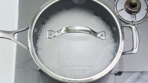Pot of rice boiling.