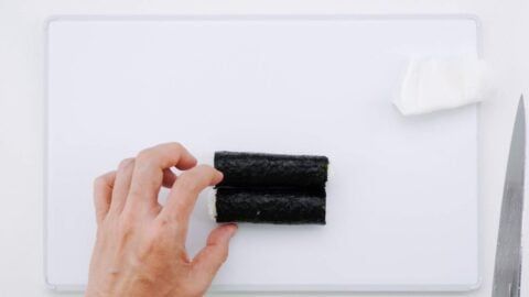 Sushi roll cut in half.