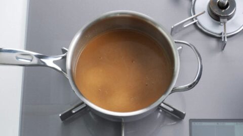 Warming up miso ramen broth.
