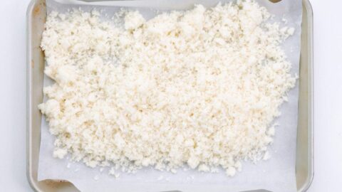 Japanese panko bread crumbs on a baking sheet.