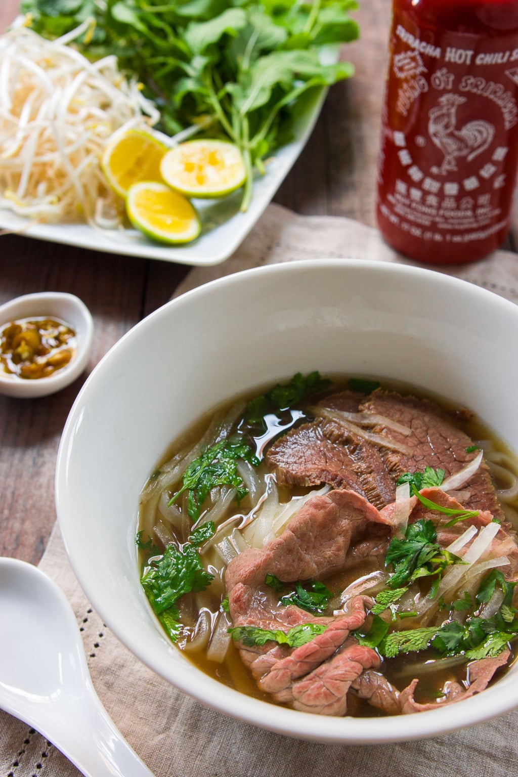 Tasty beef Pho Tai Nam with toppings.