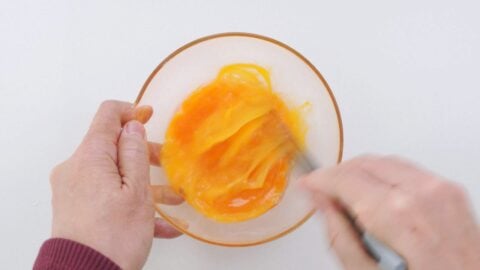 Beating eggs for omelette