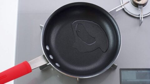Eating oil in a small frying pan.