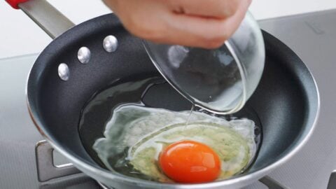 Egg frying in a pan.
