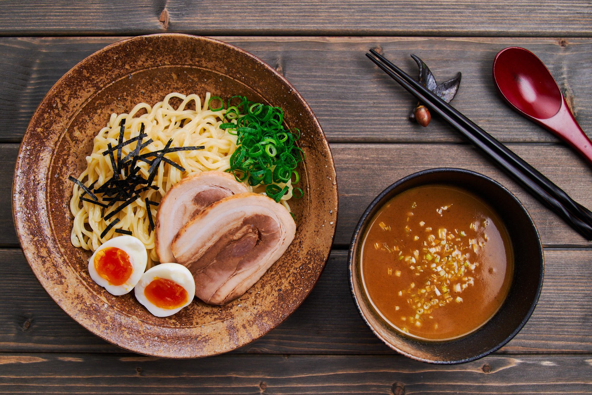 Overhead view of Japanese tsukemen noodles with an unctuous homemade ramen dipping sauce.