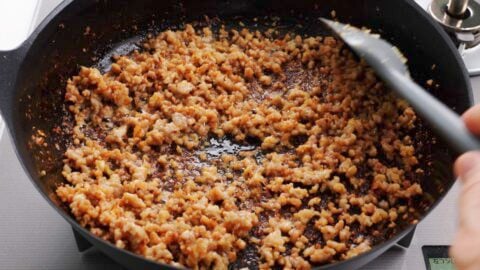 Browned pork and aromatics make the base for this tsukemen broth.