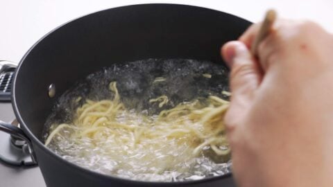 Boiling tsukemen noodles.