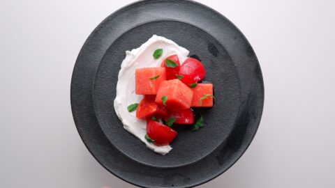 Mint, watermelon and tomato salad on a bed of labneh.