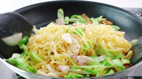 Yakisoba noodles stir fried with cabbage, pork and onions.